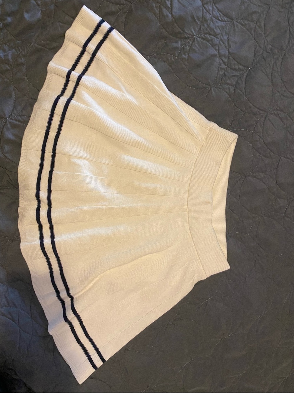 white pleated tennis skirt with navy stripes